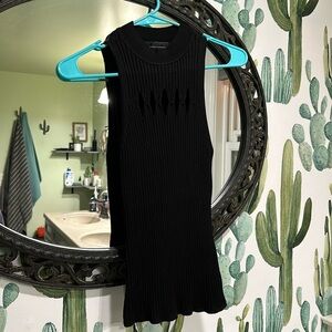 White House Black Market sleeveless top. Black knit with diamond cutouts